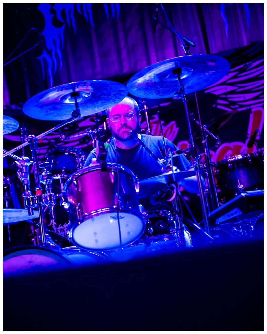 Penumbra drummer performing live behind a full drum kit